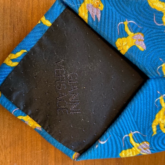 Blue Gianni Versace tie with Gold Cupid pattern. - Picture 5 of 5